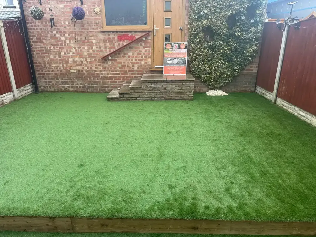 Artificial lawn with the nice and tidy sign board