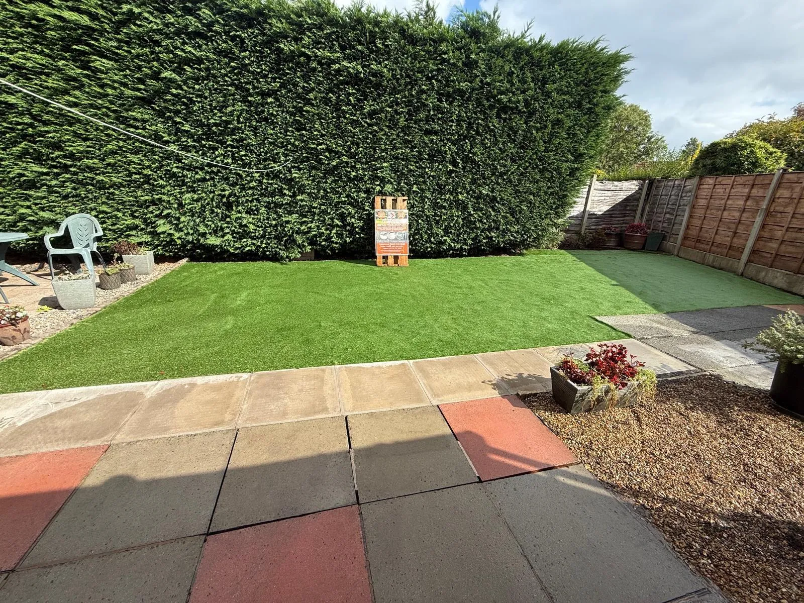 Artificial lawn above a slab patio