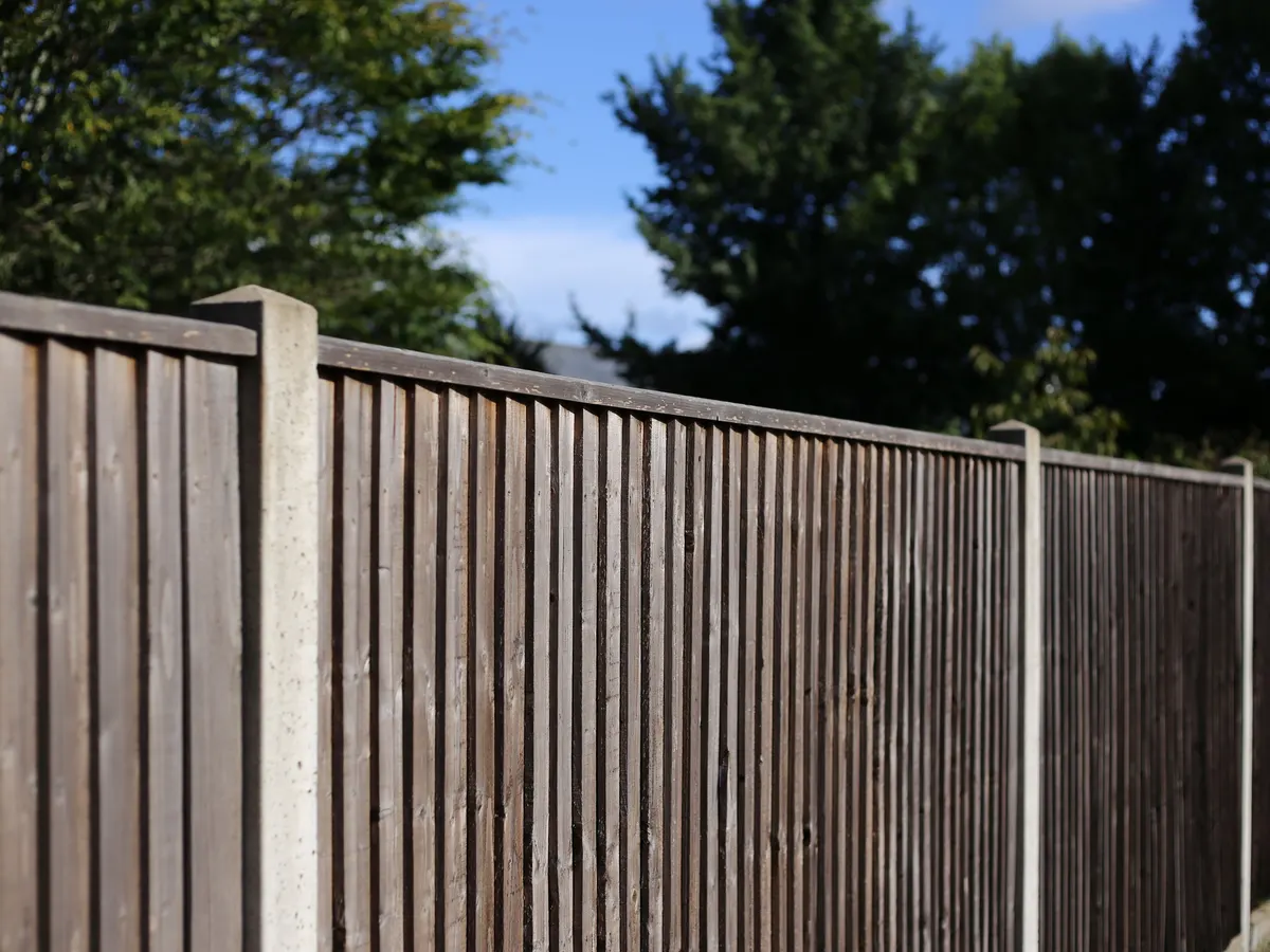 Closeboard fencing on concrete posts
