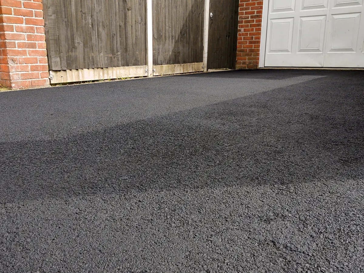 Freshly laid tarmac driveway surface